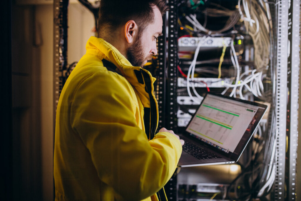 Home young man engineer making program analyses